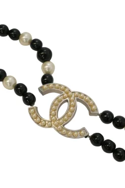 Black and ivory resin and faux pearl beaded double-strand belt with Coco Mark charm buckle