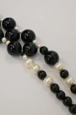 Black and ivory resin and faux pearl beaded double-strand belt with Coco Mark charm buckle
