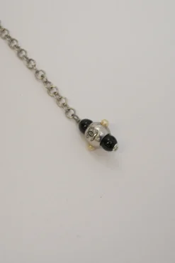 Black and ivory resin and faux pearl beaded double-strand belt with Coco Mark charm buckle
