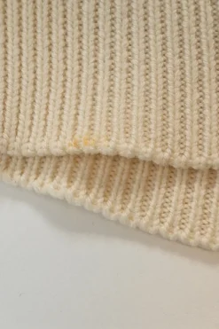 Black and ivory wool fully-fashioned abstract intarsia knit turtleneck pullover sweater with wavy hem