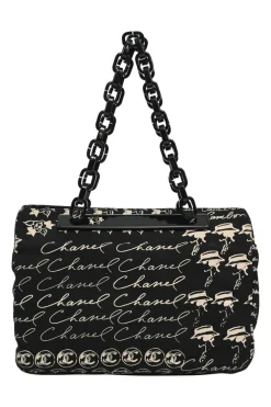 Black and neutral printed canvas and resin chain strap shopper tote featuring house code novelty motif