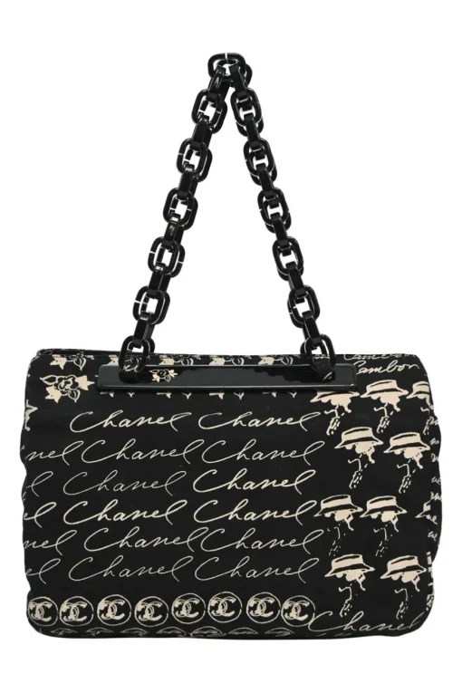 Black and neutral printed canvas and resin chain strap shopper tote featuring house code novelty motif