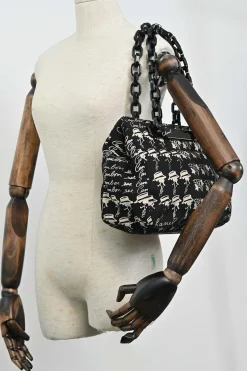 Black and neutral printed canvas and resin chain strap shopper tote featuring house code novelty motif