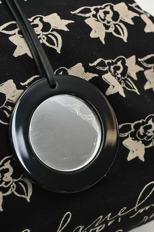 Black and neutral printed canvas and resin chain strap shopper tote featuring house code novelty motif