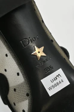 Black and neutral suede and plumetis tulle Baby D Mary Jane pumps featuring logo plaque mid-arch strap