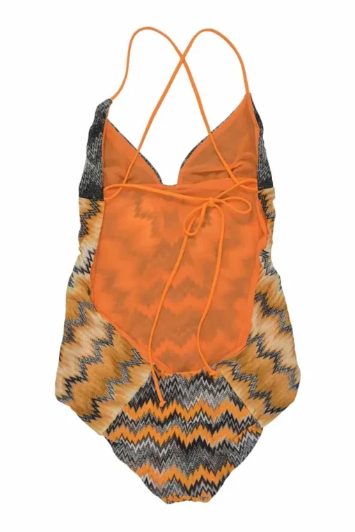 Black and orange rayon-blend paneled chevron knit halter neck one-piece swimsuit