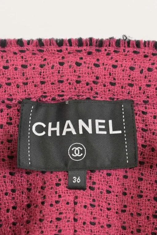 Black and pink wool-blend bouclé tweed two-piece set featuring collarless button-front jacket and mini skirt