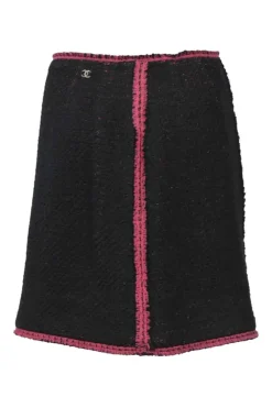Black and pink wool-blend bouclé tweed two-piece set featuring collarless button-front jacket and mini skirt