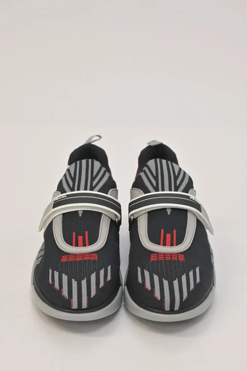 Black and red fully-fashioned warp knit and rubber Cloudbust low-top slip-on velcro sneakers