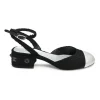 Black and silver bouclé tweed and goatskin slingback pumps with wrap buckle strap and Coco Mark heel