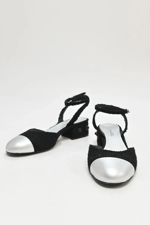 Black and silver bouclé tweed and goatskin slingback pumps with wrap buckle strap and Coco Mark heel
