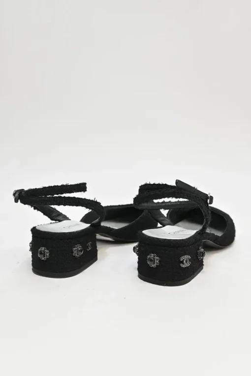Black and silver bouclé tweed and goatskin slingback pumps with wrap buckle strap and Coco Mark heel