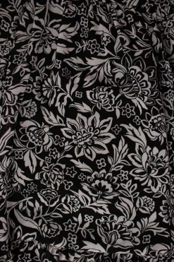 Black and white flower patterned flowy midi skirt with adjustable matching belt