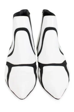 Black and white leather pointy toe ankle boots