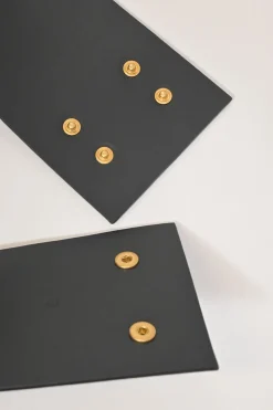 Black box calfskin and gold-finish metal ear belt featuring original Jean Schlumberger 1938 co-created house emblem earring