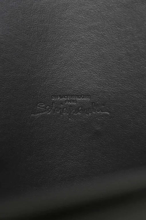 Black box calfskin and gold-finish metal ear belt featuring original Jean Schlumberger 1938 co-created house emblem earring