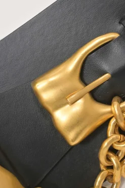 Black box calfskin and gold-finish metal ear belt featuring original Jean Schlumberger 1938 co-created house emblem earring