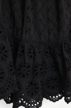 Black broderie Anglaise cotton mini A-line skirt with scalloped hem