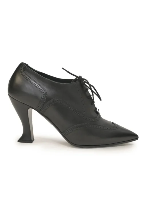 Black brogued leather pointed-toe lace-up Victorian-style heeled booties with metallic Coco Mark heel plaque appliqué