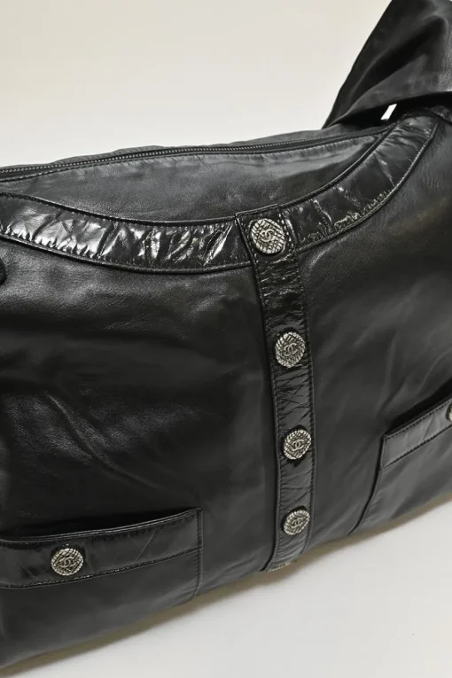 Black calfskin Girl Chanel shoulder bag with Coco Mark shank buttons