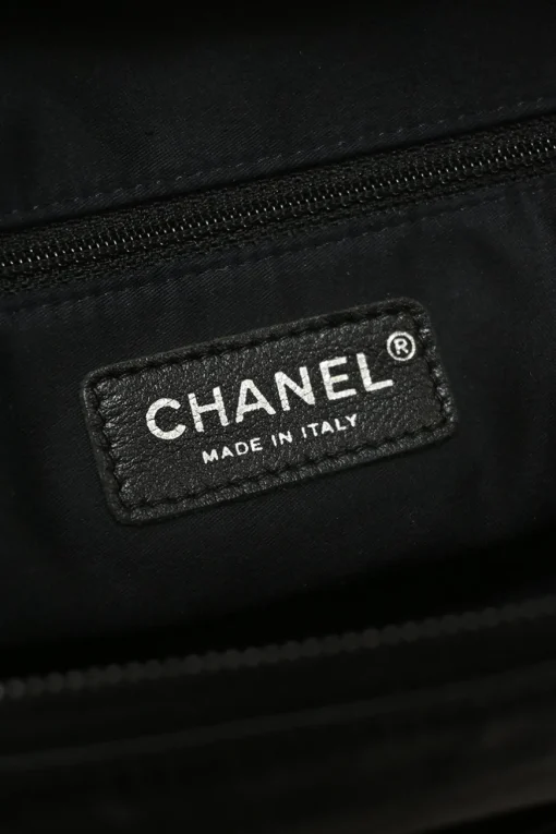 Black calfskin Girl Chanel shoulder bag with Coco Mark shank buttons