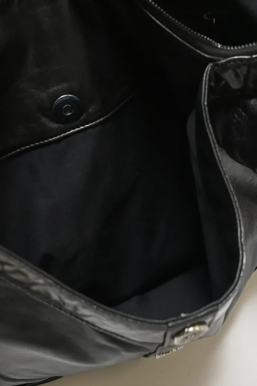 Black calfskin Girl Chanel shoulder bag with Coco Mark shank buttons