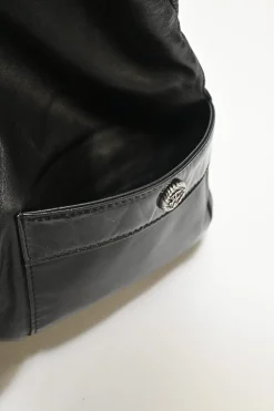 Black calfskin Girl Chanel shoulder bag with Coco Mark shank buttons