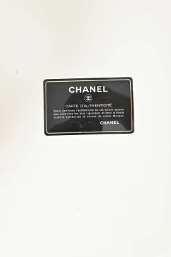 Black calfskin Girl Chanel shoulder bag with Coco Mark shank buttons