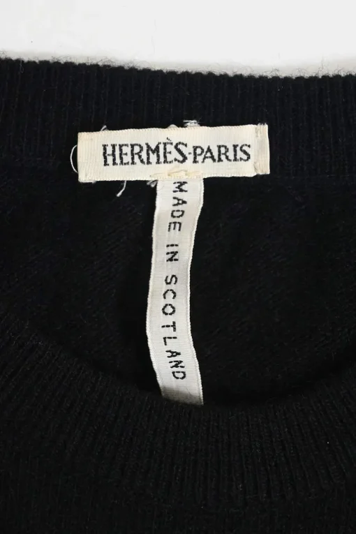 Black cashmere jersey knit two-piece set with crewneck vest and tonal button-front cardigan
