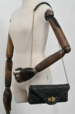 Black cloud-quilted leather crossbody chain flap bag with jade turnlock fastening