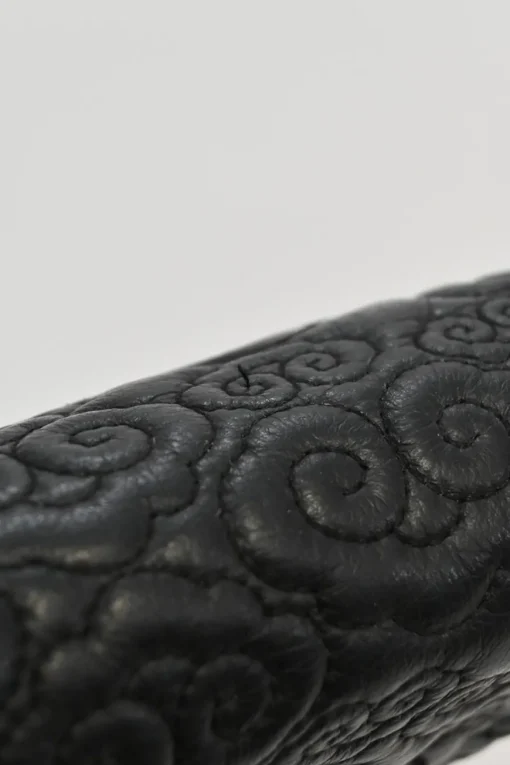 Black cloud-quilted leather crossbody chain flap bag with jade turnlock fastening