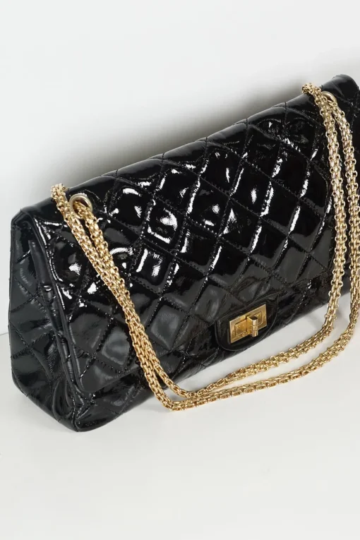 Black coated crinkle leather 2.55 flap bag with gold tone chain
