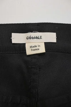 Black coated high-rise woven pants with turn-up cuffs