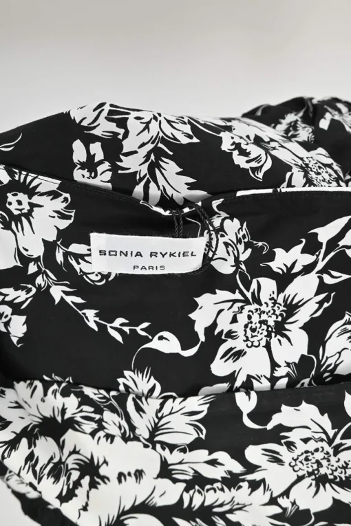Black cotton floral print pull-on high-rise midi A-line skirt with ruffle-tiered hem