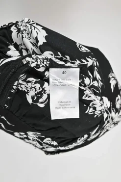 Black cotton floral print pull-on high-rise midi A-line skirt with ruffle-tiered hem
