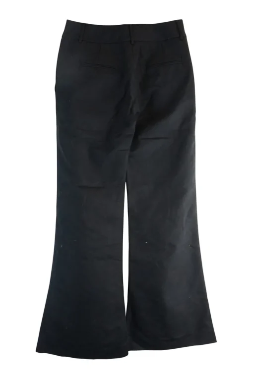 Black cotton low-rise flared tailored trousers with concealed bar and zip closure at front