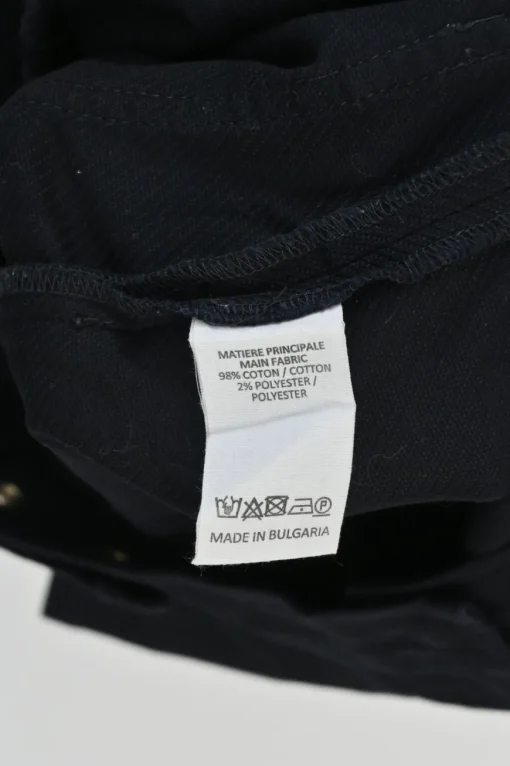 Black cotton-blend pull-on high-rise wide-leg shorts with metallic shank button waist adjusters