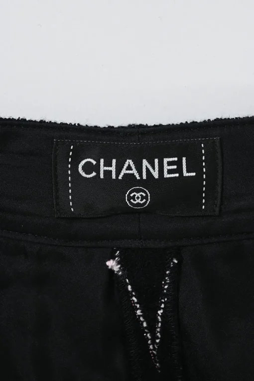 Black cotton-blend stripe jacquard pleat-front tailored shorts with Coco Mark shank button and fly front fastening