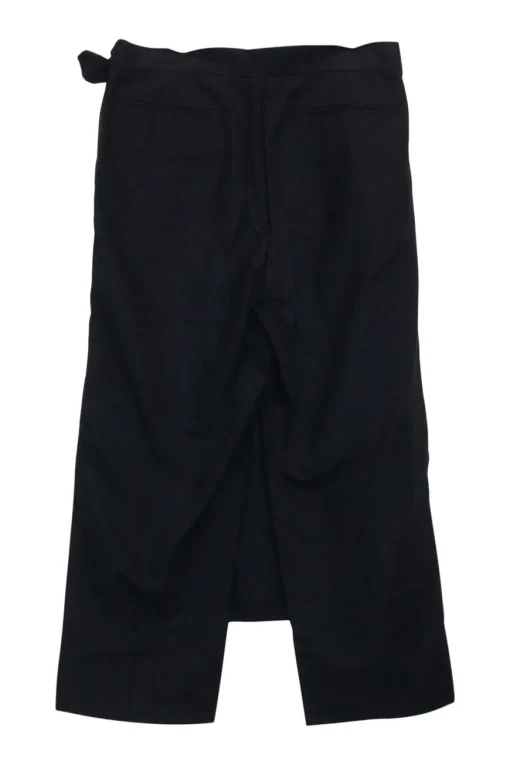 Black cotton-silk blend high-rise apron trousers with ribbon tie at waist with slanted hip pockets