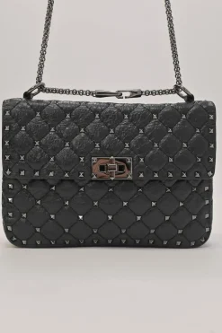 Black crinkle leather Rockstud spike crossbody flap bag with gunmetal hardware
