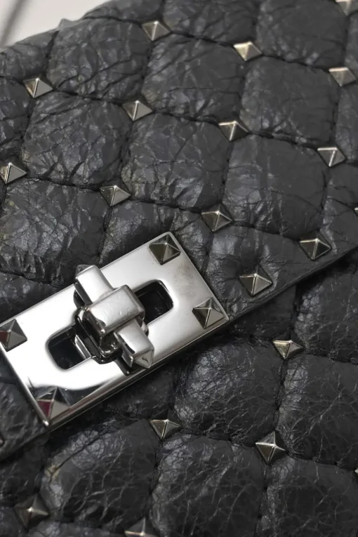 Black crinkle leather Rockstud spike crossbody flap bag with gunmetal hardware