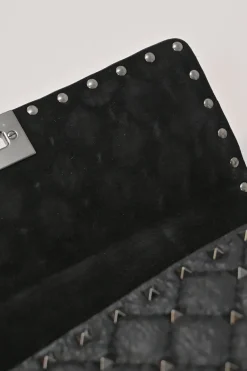 Black crinkle leather Rockstud spike crossbody flap bag with gunmetal hardware