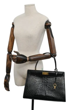 Black croc-embossed leather trapeze-shaped Lee Radziwill satchel with gold-tone metallic hardware