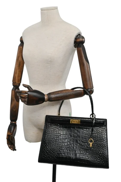 Black croc-embossed leather trapeze-shaped Lee Radziwill satchel with gold-tone metallic hardware