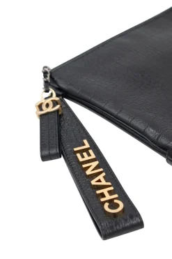 Black crocodile style textured clutch with gold tone hardware