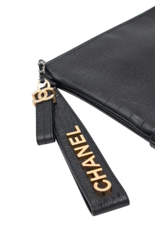 Black crocodile style textured clutch with gold tone hardware