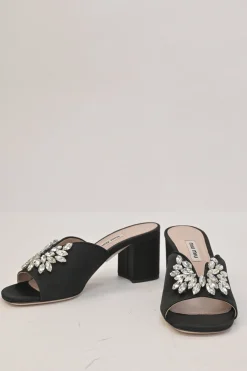 Black crystal-embellished satin and leather block heel mules with curved V-neck vamp