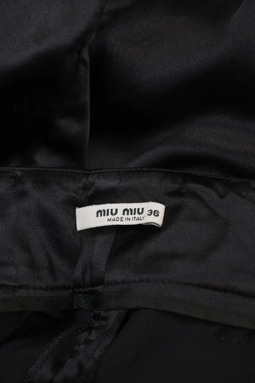 Black draped silk satin tie-waist Bloomer bermuda shorts with turn-up cuffs