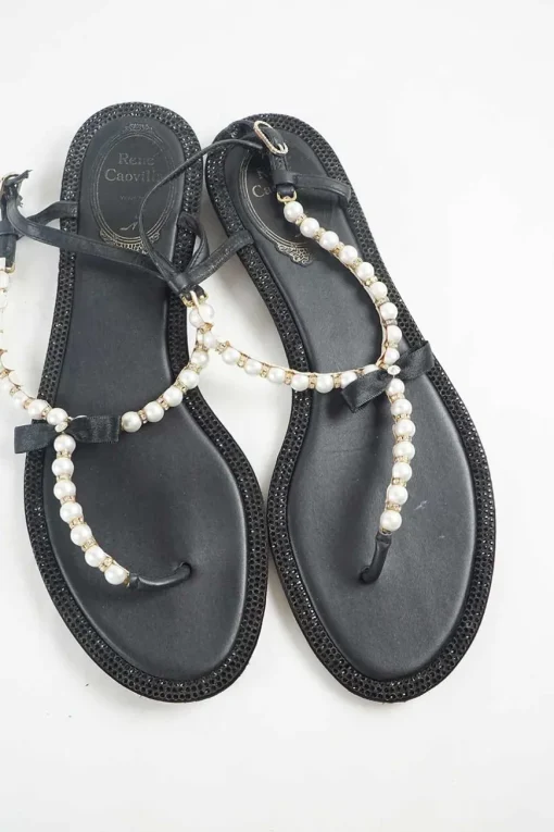 Black faux-pearl embellished leather thong sandals with adjustable buckle ankle strap