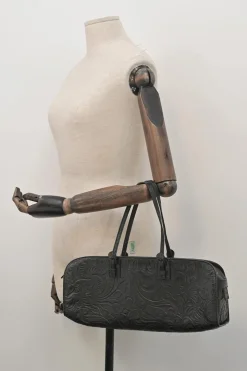 Black floral-embossed leather East West Boston bag